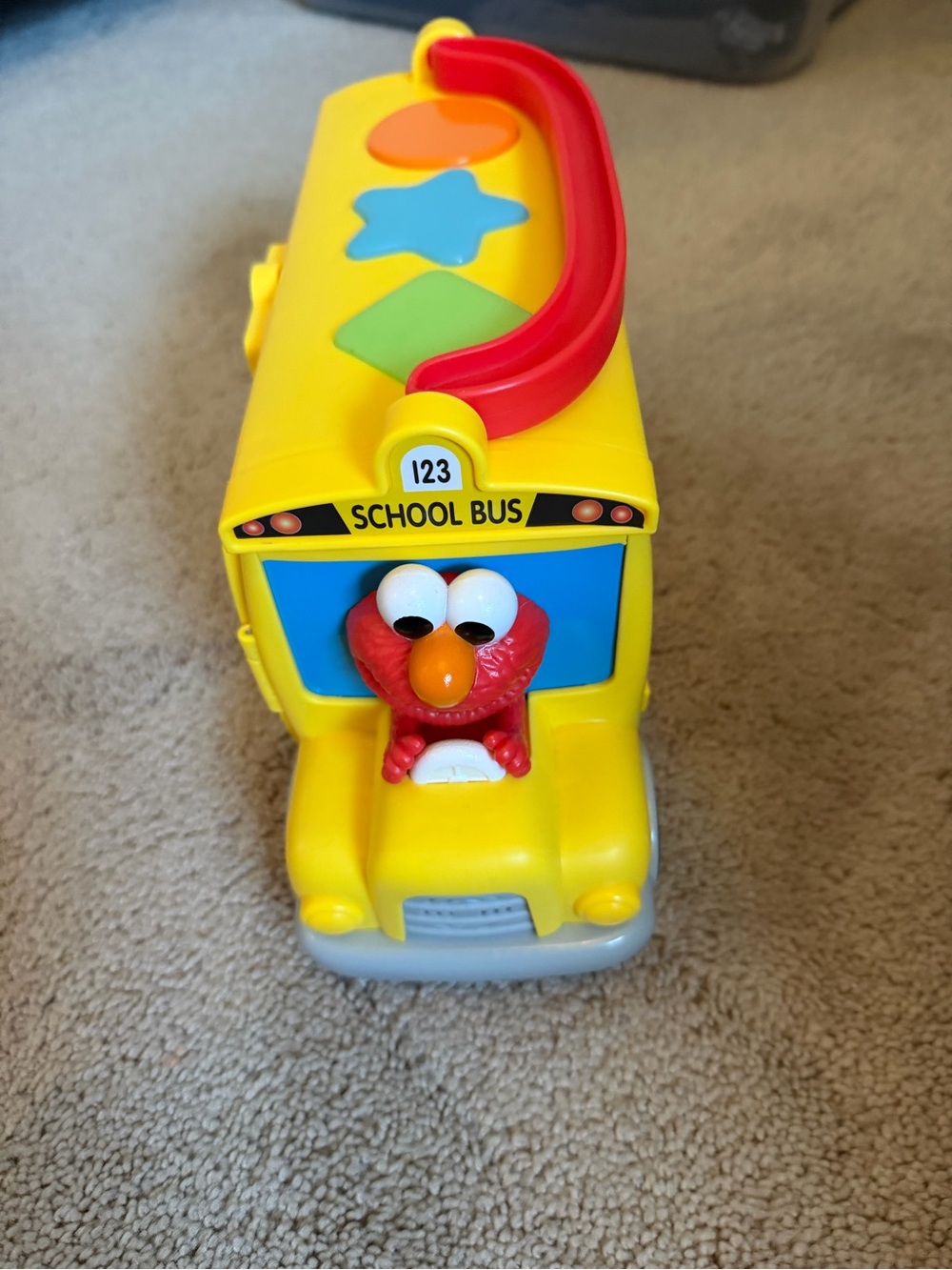 Sesame Street Yellow School Bus Toy with Red Elmo and Red Handle